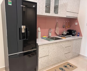 Private kitchen - Vinhomes Grand Park Homestay-Sweet Home (Ho Chi Minh City)