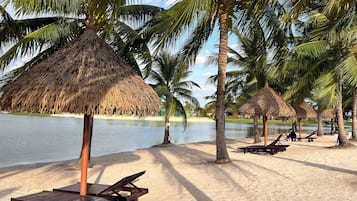 On the beach, white sand, free beach shuttle, sun-loungers