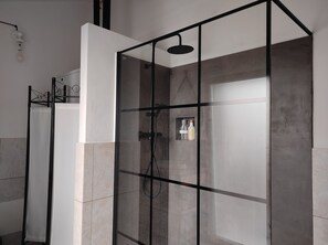 Bidet, towels, toilet paper