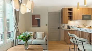 Comfort Apartment, City View | Living area | 80-cm Smart TV with digital channels