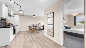 2 bedrooms, desk, iron/ironing board, travel crib