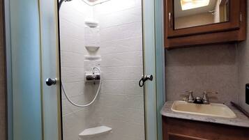 Shower, hair dryer, towels