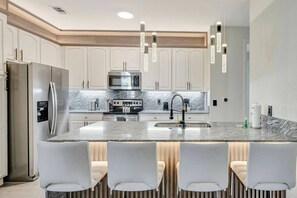 Fridge, microwave, oven, stovetop - Luxury 4BR · Vista Cay Resort (Orlando)