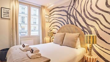 3 habitaciones, tabla de planchar con plancha, wifi y ropa de cama