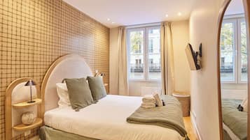 3 habitaciones, tabla de planchar con plancha, wifi y ropa de cama