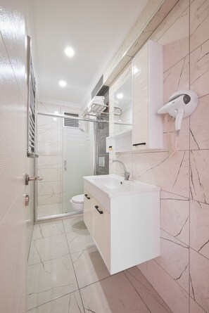 Free toiletries, hair dryer, slippers, towels