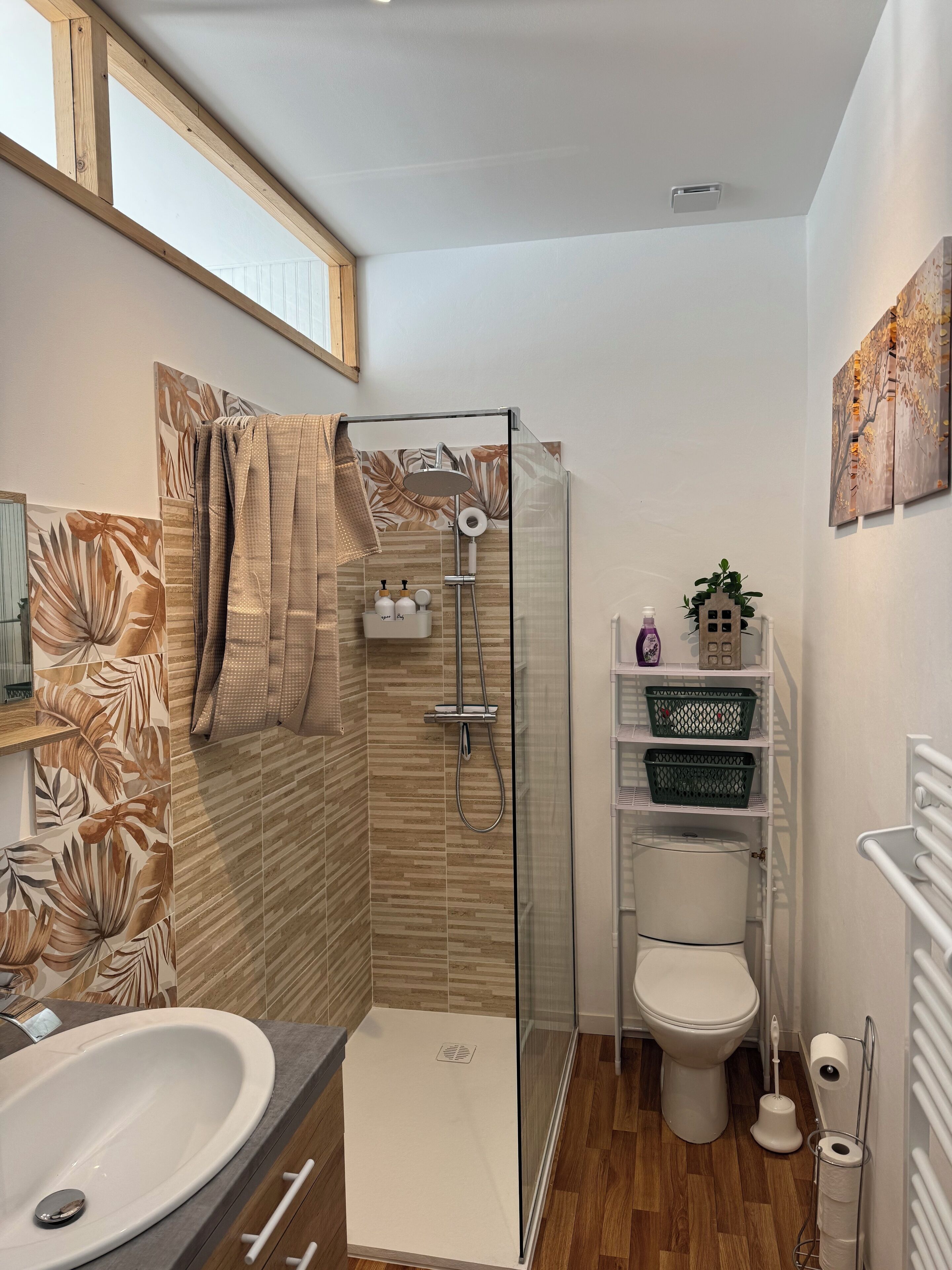 Shower, hair dryer, towels, toilet paper