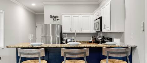 Bright, modern space to cook and dine.