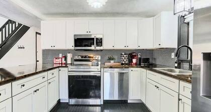 Modern 4 Bedroom Home with Sauna and Game Room in Gated Lake Community