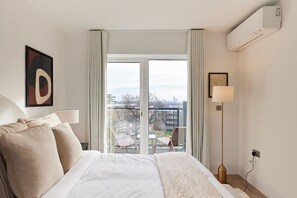 2 slaapkamers, een strijkplank/strijkijzer, beddengoed