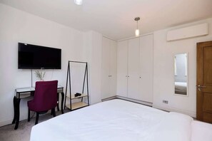 4 habitaciones, tabla de planchar con plancha, wifi y ropa de cama 