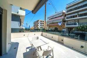 Suite Classique, vue ville | Terrasse/Patio