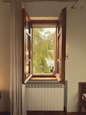 Habitación doble, vista al jardín | Ropa de cama