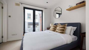 2 habitaciones, tabla de planchar con plancha, wifi y ropa de cama