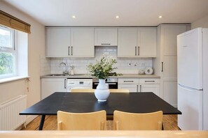 Fridge, oven, toaster, cookware/dishes/utensils