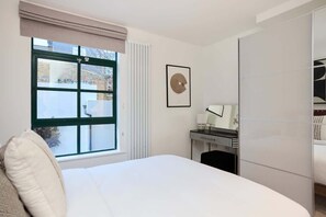 2 slaapkamers, een strijkplank/strijkijzer, wifi, beddengoed