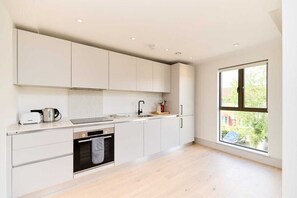 Fridge, oven, electric kettle, toaster