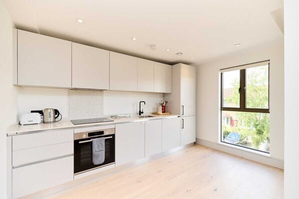 Fridge, oven, electric kettle, toaster