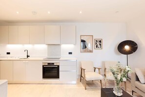 Fridge, oven, cookware/dishes/utensils