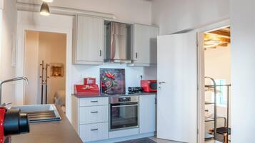 Deluxe Apartment, Balcony, Sea View | Living area