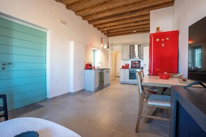 Deluxe-Apartment, Balkon, Meerblick | Wohnbereich