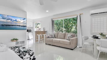 Superior Studio Suite, Patio, Garden View | In-room safe, blackout drapes, iron/ironing board