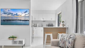 Superior Studio Suite, Patio, Garden View | In-room safe, blackout drapes, iron/ironing board