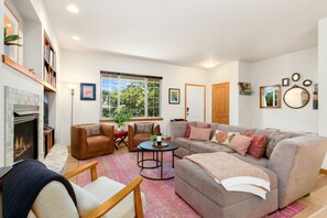 Smart TV, fireplace, table football, books