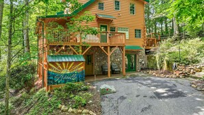 A log cabin with a balcony, stone foundation, and a sign reading 'Morning Star Aheville.' - 15 MINUTES FROM ASHEVILLE! Secluded peacefull LOG CABIN (Leicester)