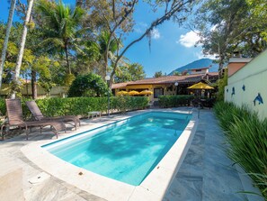 Outdoor pool, open 9:00 AM to 10:00 PM, pool umbrellas, sun loungers