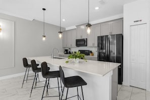 Fridge, microwave, oven, stovetop - Modern Family Retreat w/ Pool Near Disney (Kissimmee)