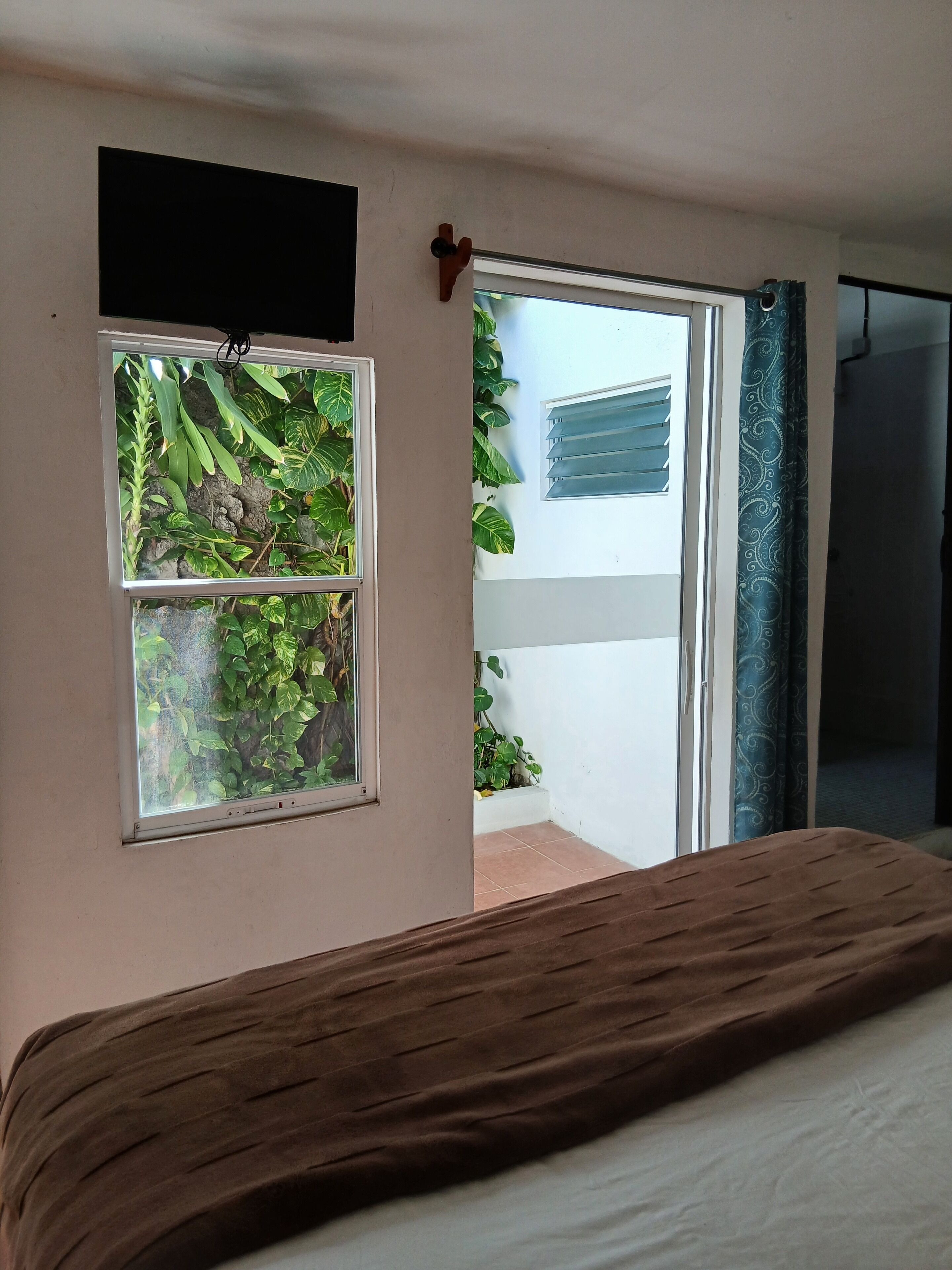 Habitación cuádruple familiar, balcón, vista al jardín | Wifi gratis 