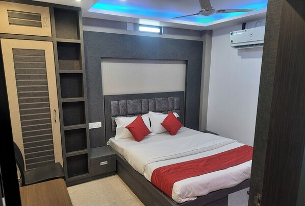 Quarto casal standard | Área de estar