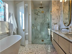 Shower, hair dryer, towels, soap