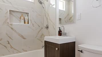 Hair dryer, towels, soap, toilet paper