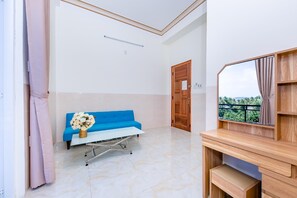 Suite estudio familiar | Área de sala de estar