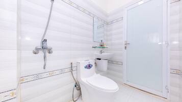 Suíte estúdio família | Banheiro | Sabonete, shampoo