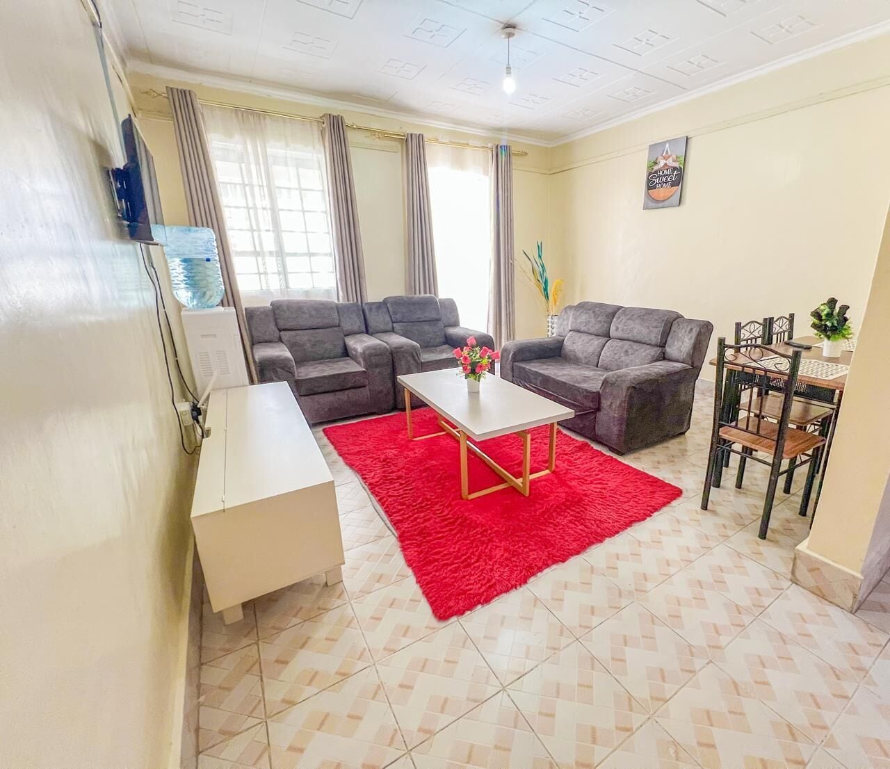 Classic Apartment, City View | Living area | 24-inch Smart TV with digital channels