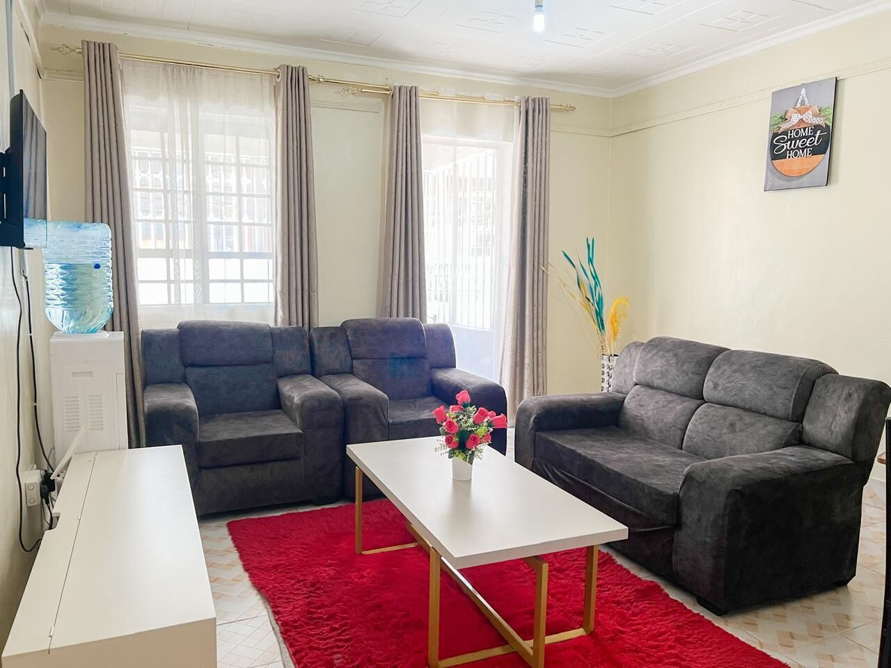 Classic Apartment, City View | Living area | 24-inch Smart TV with digital channels