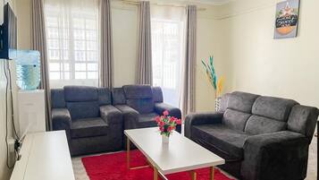 Apartemen Klasik, pemandangan kota | Area keluarga | Smart TV 24-inci dengan saluran TV digital