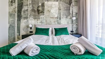 Deluxe Apartment, 1 Bedroom, Kitchenette, City View | Hypo-allergenic bedding, desk, laptop workspace, iron/ironing board