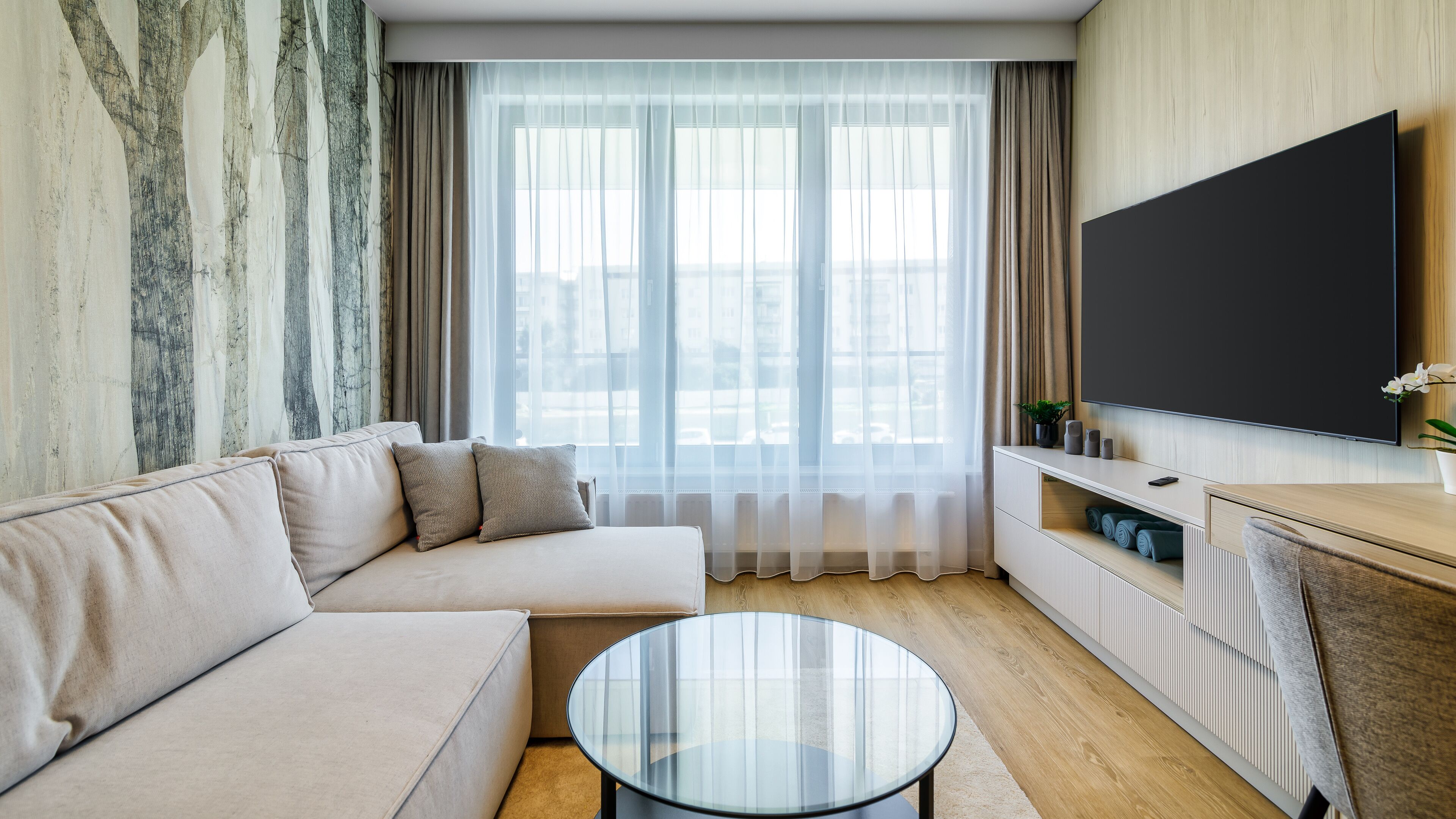 Deluxe Apartment, 1 Bedroom, Kitchenette, City View | Living room | 55-cm Smart TV with digital channels, Netflix, streaming services