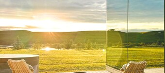 Nest Retreat Iceland - Mirror House by riverbank