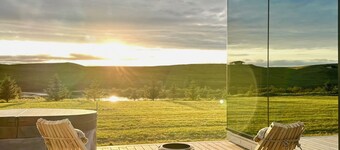 Nest Retreat Iceland - Mirror House by riverbank