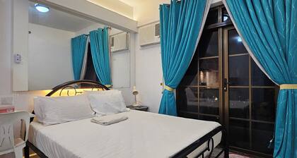 Cozy 1-bedroom condo with AC and WiFi in central Davao City