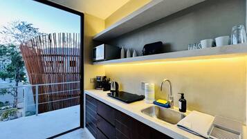 Fridge, microwave, stovetop, cookware/dishes/utensils