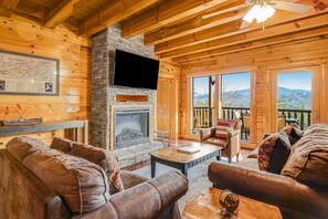 TV connectée, cheminée, lecteur de DVD, baby-foot