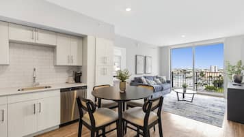 Deluxe Condo, Balcony, City View | Private kitchen | Coffee/tea maker, toaster, blender, paper towels