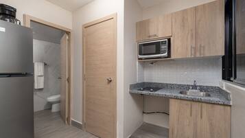 Fridge, microwave, coffee/tea maker, toaster