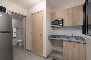 Fridge, microwave, coffee/tea maker, toaster